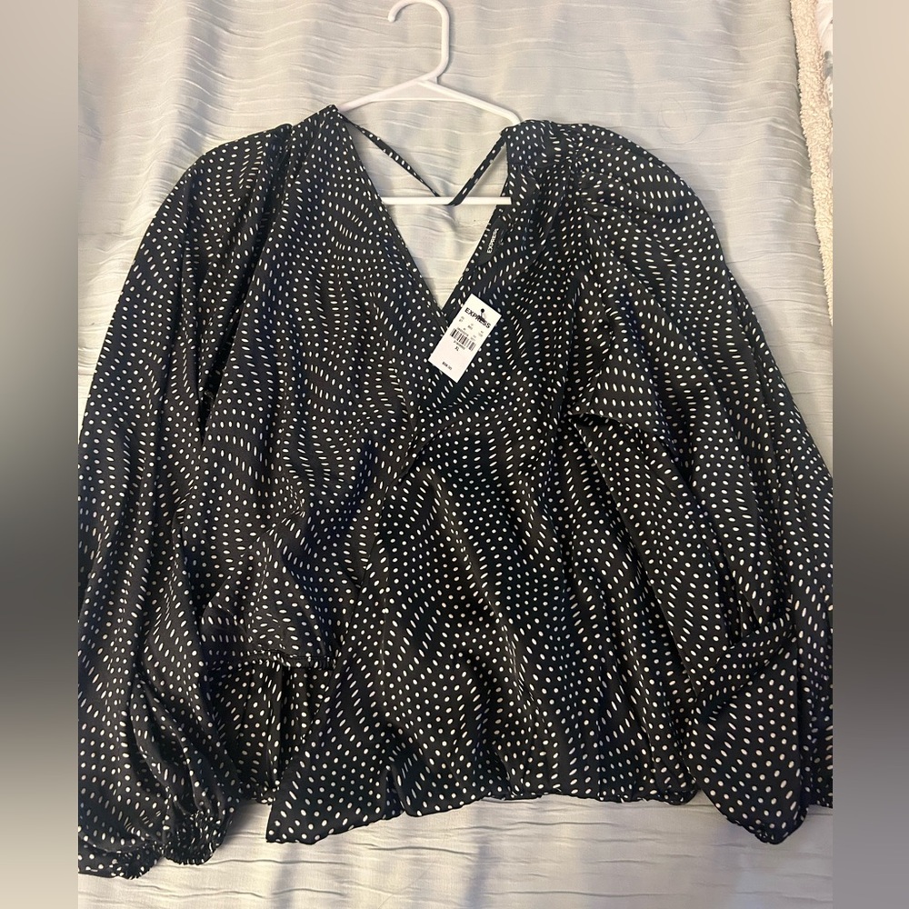 NWT XL Express polyester/spandex black and white polka dot blouse.